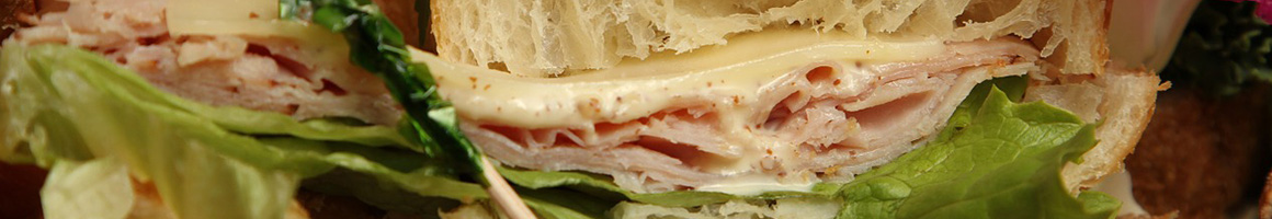 Eating Sandwich at Me & Ollie's Bakery & Cafe restaurant in Exeter, NH.